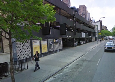 City Planning needs to decide whether to legalize this parking garage make its illegal extra cars