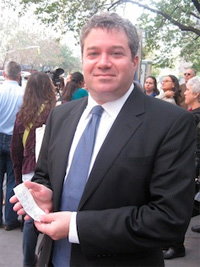 Assembly Member Jonathan Bing shows off his Select Bus Service receipt. Photo: Noah Kazis