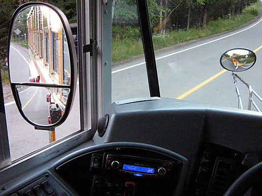The Cross Over Mirror, on the right, allows truck and school bus drivers to see in front of their hood. Photo: __.