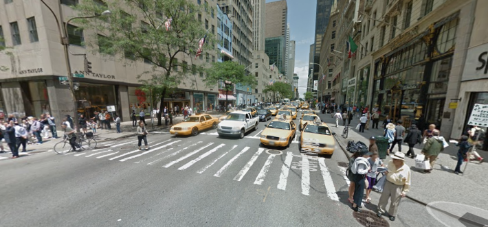 Fifth Avenue at 48th Street: Lots of space for cars; bike riders and walkers on the margins. Photo: Google Maps