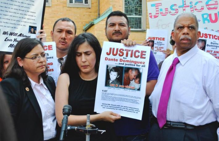 Family members of hit-and-run victim Dante Dominguez, with Council Members Rosie Mendez and Leroy Comrie. Photo: ##http://www.qchron.com/editions/queenswide/flushing-hit-and-run-inspires-council-bill/article_232113e3-a3d4-5ca0-97dd-f26b871953ca.html##Queens Chronicle##