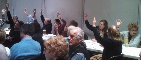 CB 7 members, including longtime transportation committee co-chairs Andrew  Albert and Dan Zweig, left, vote for a resolution asking DOT to study a complete street redesign on Amsterdam Avenue. Photo: Steve Vaccaro/Twitter