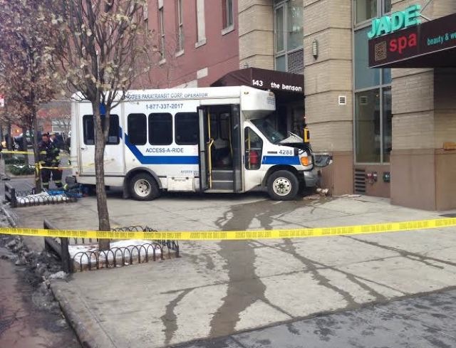 An Access-a-Ride Driver jumped the curb on 34th Street, injuring one pedestrian. Photo: ##http://gothamist.com/2013/12/19/two_injured_in_access-a-ride_crash.php##Gothamist##