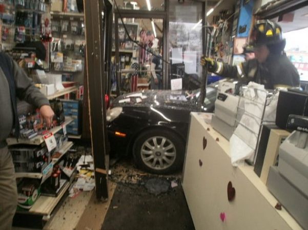 A driver on Staten Island crashed through the glass storefront. Photo: ##http://www.silive.com/news/index.ssf/2014/01/driver_smashes_through_reimans.html##Advance##