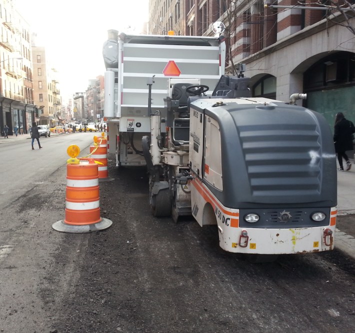 Crews have already begun work on a repaving project that will include a protected bike lane on Lafayette Street and Fourth Avenue. Photo: Stephen Miller