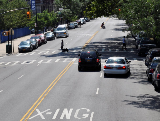CB 10's chair is worried that adding pedestrian islands to Morningside Avenue will cause problems for double-parkers. Photo: DOT