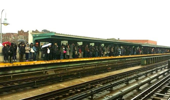 Straphangers pack a subway platform in Queens this morning. The $30 million Governor Cuomo diverted from the MTA budget could have been used to address subway overcrowding. Photo: ##https://twitter.com/lreynolds21363/status/450610751632588800##@lreynolds21363## via ##http://gothamist.com/2014/03/31/mta_is_trying_to_break_your_heart.php##Gothamist##
