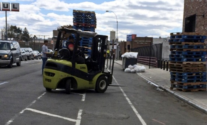 Who needs newly-built loading docks when you can take over the sidewalk and the bike lane? Photo: Brooklyn Spoke/Twitter