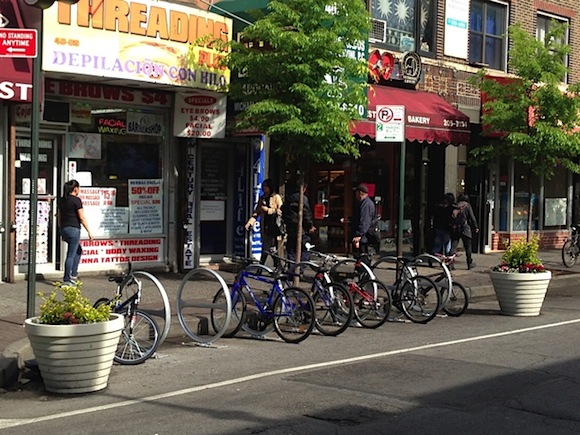 Jackson Heights is one of many NYC neighborhoods that survived the installation of bike corrals. Photo: Clarence Eckerson Jr.