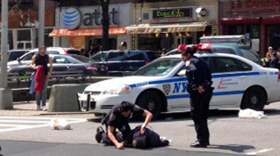 An officer in a marked NYPD cruiser struck and critically injured a 69-year-old pedestrian on Broadway. Witnesses contradicted NYPD accounts that the police were using lights and sirens. Photo: ##https://twitter.com/NBCNewYork/status/455425622085750784/photo/1##@NBCNewYork##