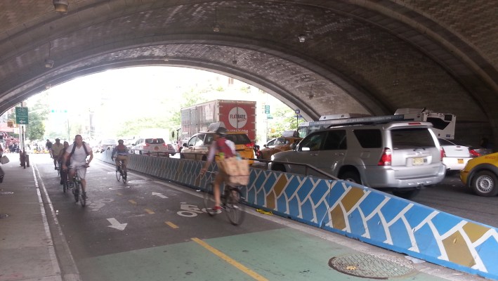 The two-way bike path on FIrst Avenue between 59th and 60th Streets now has a concrete barrier to match its tiled ceiling. Photo: Stephen Miller