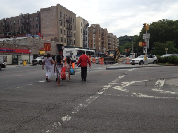 DOT extended a pedestrian island that separates north- and southbound lanes on Riverside Drive at Broadway and Dyckman Street, adding space for pedestrians and forcing drivers to slow their turns. Photos: Brad Aaron