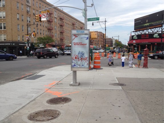 New concrete at the southeast corner, looking north on Broadway.