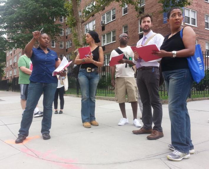 Harlem residents point out how to improve safety on streets near the Harlem River Bridges on Saturday. From left: Abena Smith, president of the 32nd Precinct community council; community council vice president Sherri Culpepper; Louis Bailey of WE ACT for Environmental Justice; Tom DeVito of Transportation Alternatives; and Maria Barry, chair of Manhattan Community Board 10's Vision Zero task force. Photo: Stephen Miller