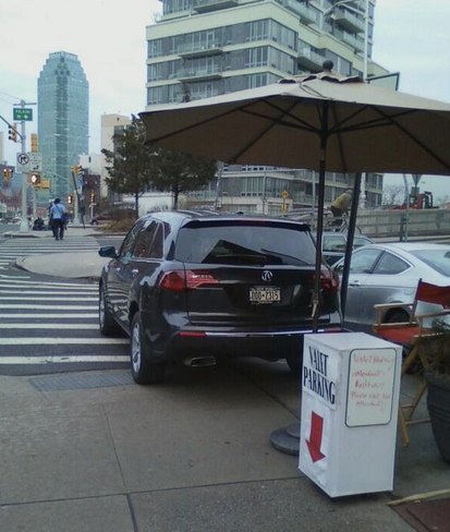 Manetta’s Restaurant in Long Island City takes over the sidewalk and the access ramp for valet parking. Classy. Photo: ##https://twitter.com/alter_spaces/status/449690329835249664/photo/1##@alter_spaces##