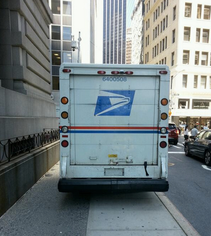 The U.S. Postal Service delivers near-total sidewalk obstruction to pedestrians at Broadway and State Street. Photo: ##https://twitter.com/simonsmith1978/status/485910301846822912/photo/1##@simonsmith1978##