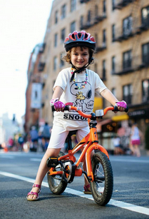 Galit Gordon is ready for the inaugural Kidical Mass NYC ride. Photo: Dmitry Gudkov via ##https://twitter.com/BrooklynSpoke/status/498895992528601088/photo/1##@BrooklynSpoke##