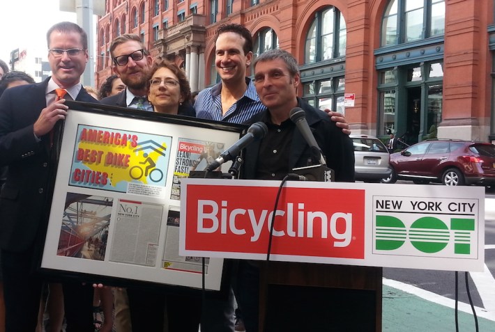 Bicycling Magazine publisher Zachary Grice, left, awards DOT Commissioner Polly Trottenberg, center, with recognition of New York City as America's best city for biking. They are joined by Transportation Alternatives executive director Paul Steely White, second from left, Bike New York executive director Kenneth Podziba, second from left, and Bicycling Magazine Editor-in-Chief Bill Strickland, left. Photo: Stephen Miller
