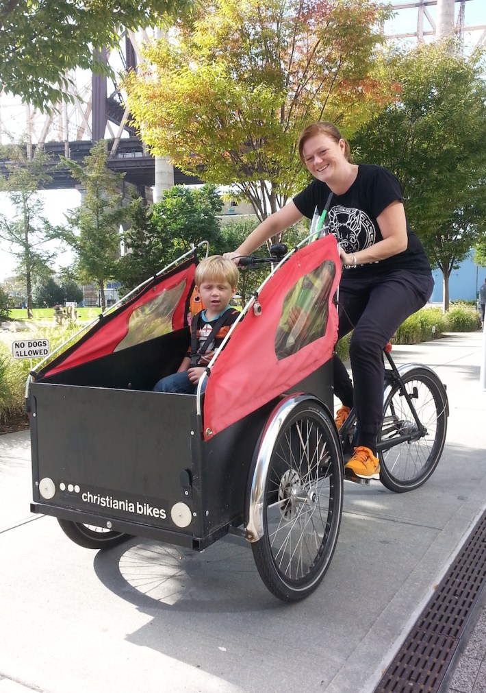 Birgitte Noël is a Roosevelt Island resident who uses her bike to run errands with her son. Photo: Stephen Miller