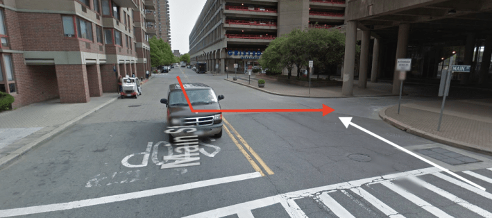 The bus driver was making a turn, in red, when he struck cyclist Anna Maria Moström, whose path is shown in white. NYPD's preliminary investigation results fault the driver, but no charges have been filed. Photo: Google Maps
