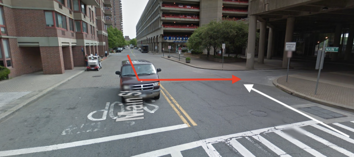 The bus driver was making a turn, in red, when he struck cyclist Anna Maria Moström, whose path is shown in white. NYPD's preliminary investigation results fault the driver, but no charges have been filed. Photo: Google Maps