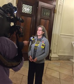 Amy Cohen, whose son Sammy Cohen Eckstein was killed by a motorist last year, speaks to the media after today's City Council vote to lower the default city speed limit to 25 mph. Photo: ##https://twitter.com/killercatch/status/519562268363612162/photo/1##Caroline Samponaro/Twiiter##