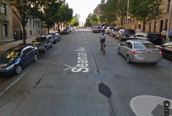 Rough street surface and barely visible bike lanes on the southern end of Seaman, which DOT has not repaved. Image: Google Maps