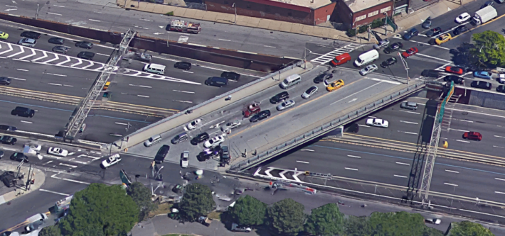 Does DOT really think that sharrows are enough to make this expressway on-ramp safe for cyclists? Photo: Google Maps