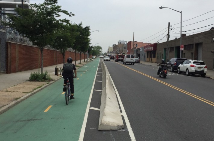 New concrete barriers are being added to Vernon Boulevard in Queens. Photo: Clarence Eckerson Jr.