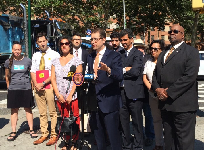 Council Member Mark Levine speaks in support of bus lanes on 125th Street in West Harlem. He was joined by Transportation Committee Chair Ydanis Rodriguez and advocates from Riders Alliance, Tri-State Transportation Campaign, Transportation Alternatives, and StreetsPAC. Photo: Stephen Miller