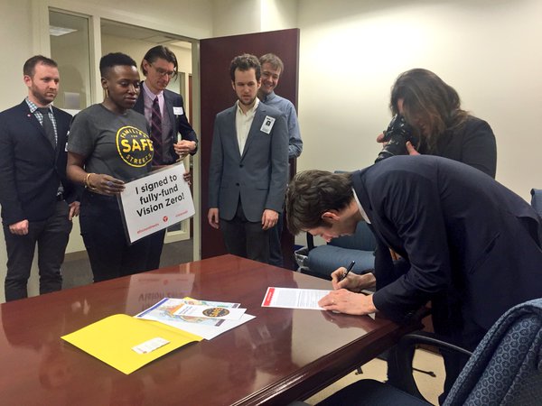 Stephen Levin (right) was one of thirteen council members to sign onto TA's pledge to fully fund Vision Zero projects in 2016. Photo: Kristen Miller