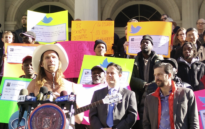 Before today's hearing, Robert Burck, otherwise known as Times Square's famous "Naked Cowboy," spoke out in favor of legislation proposed by Council Members Corey Johnson and Dan Garodnick (second from right).