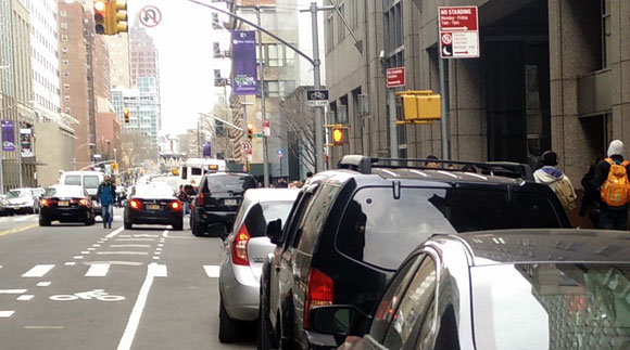 Good-bye to all that: with a protected bike lane, Jay Street will (hopefully) be rid of its notorious double-parking.