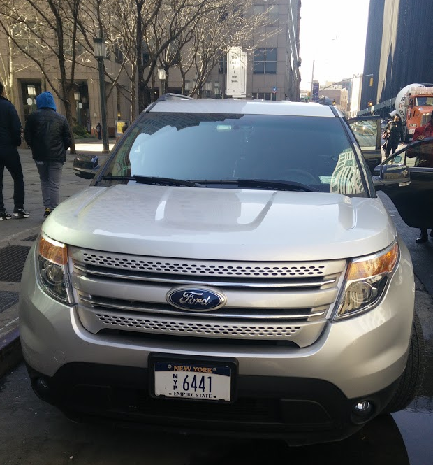 A car with state-issued press license plates parked illegally on Jay Street in Downtown Brooklyn. Photo: David Meyer