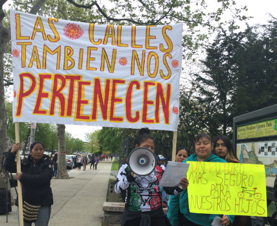 Veronica Ramirez of Mujeres en Movimiento speaks to marchers. Photo: David Meyer