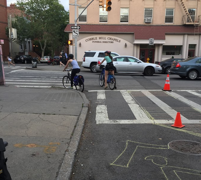 Cyclists doing the "Amity Wiggle" during a demonstration set up by community members on Tuesday. Photo: David Meyer