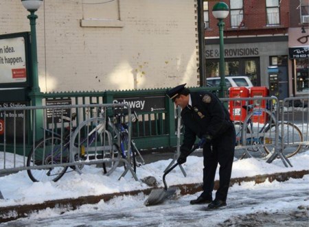 Ameri shoveling the Bergen Street bike lane in 2014. Photo: N. Wayne Bailey