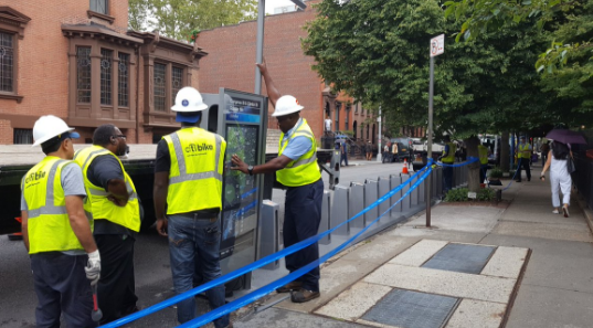 A station installation yesterday at Clinton Street and Congress Street in Cobble Hill. Photo: NYC DOT