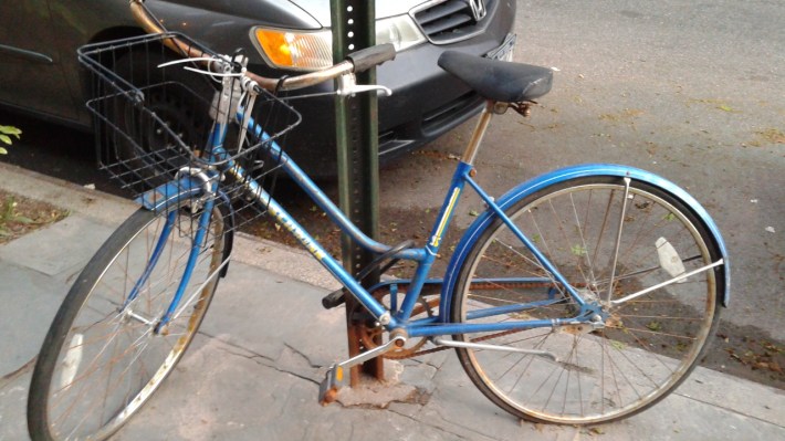 This blue Schwinn on President Street in Park Slope has been locked to the same pole for three years. Photo: Recycle-A-Bicycle