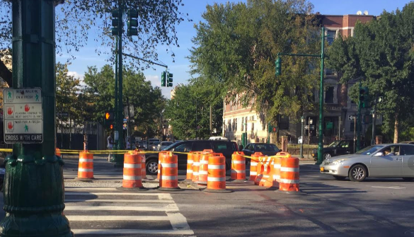 Pedestrian islands on Eastern Parkway barely lasted nine months before DOT ripped them up, and no one in the de Blasio administration will say why. Photo: David Meyer