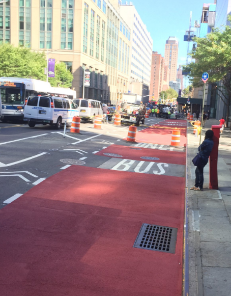 The redesign of Jay Street allows cyclists to pass around buses while remaining protected by a wide buffer zone. Photo: Brandon Chamberlin