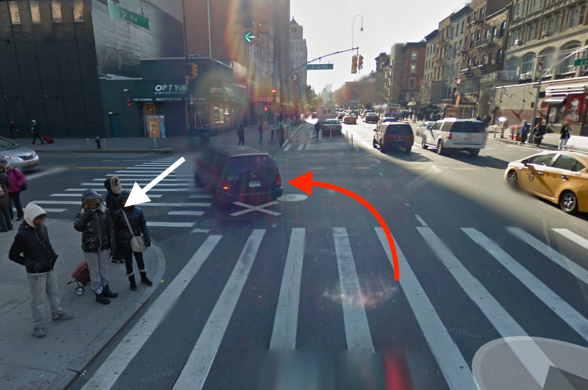 An FDNY ambulance driver turning left fatally struck Gen Zhan as he crossed E. 14th Street at Second Avenue. The white arrow represents Zhan’s path, and the red arrow indicates the path of the driver. Image: Google Maps