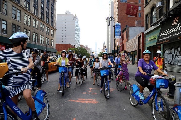 Dozens of people participated in a bike ride today to celebrate Women’s Bike Month and the return of a protected bike lane on Sixth Avenue. Photos: NYC DOT