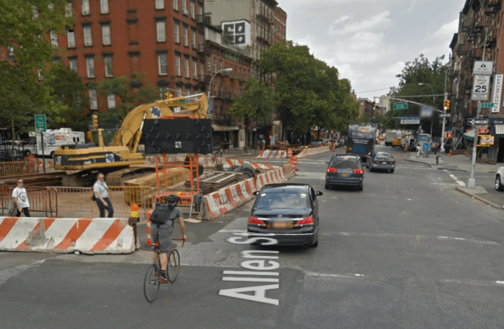 For years, cyclists crossing East Houston Street between the Allen Street and First Avenue protected lanes were forced into traffic by construction zones. Photo: Google Maps