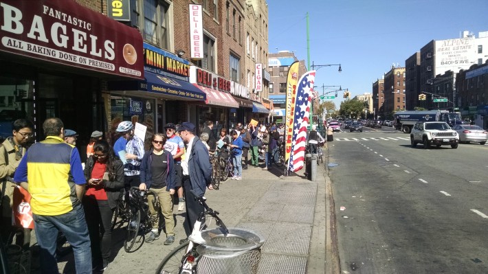 Proponents of a Verrazano Bridge biking and walking paths line up to put their bikes on MTA buses, which only hold two bikes at a time. at 4th Avenue and 86th Street in Bay Ridge on Saturday to put their bikes on bus racks (two per bus).