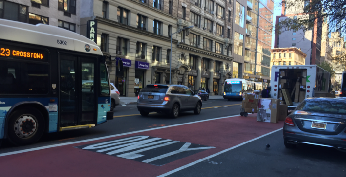 A delivery truck forced this bus out of 23rd Street's dedicated bus lanes. Photo: David Meyer