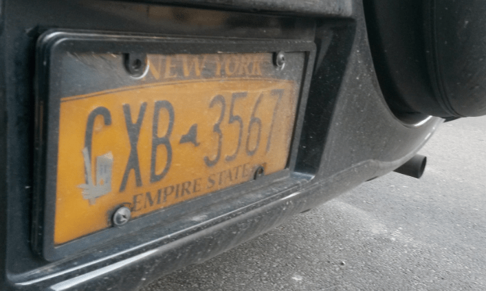 The owner of this vehicle, claims to be an NYPD officer, has received tickets from speed cameras, red light cameras, and bus lane cameras. Photo: @placardabuse