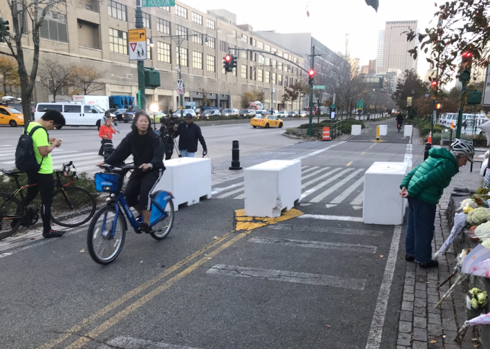 NYPD installed concrete cubes at 26 pedestrian crossing along the greenway, including here at Houston Street. Photo: Mark Gorton