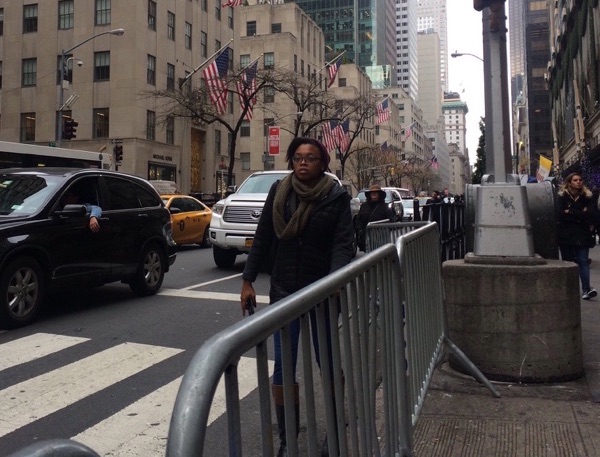 Caught between an NYPD fence and moving traffic on Fifth Avenue by Rockefeller Center. Photo: Nicole Gelinas