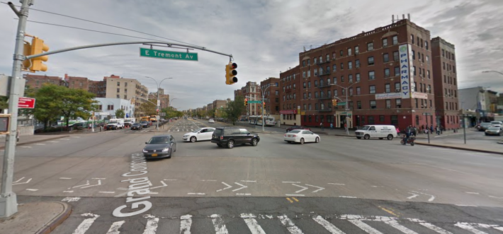 The view looking north from the Grand Concourse's central roadway at E Tremont Avenue. Image via Google Street View